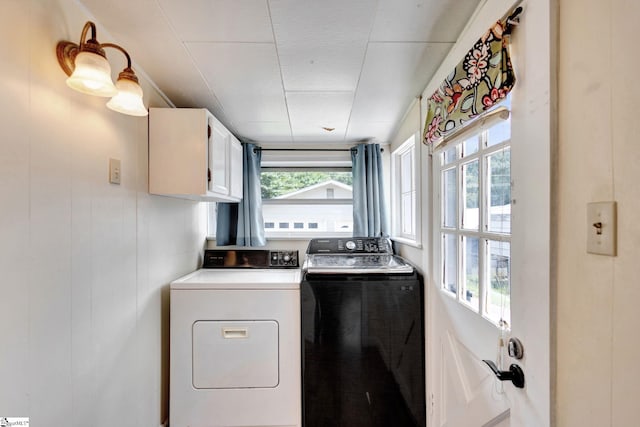 506 Piedmont Hwy, Piedmont, SC 29673 - laundry room featuring cabinet space, washer and clothes dryer, and healthy amount of natural light
