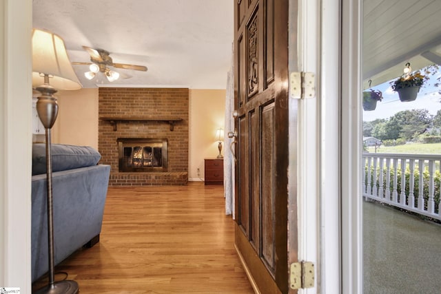 506 Piedmont Hwy, Piedmont, SC 29673 - living area featuring ceiling fan, light wood-type flooring, and a brick fireplace