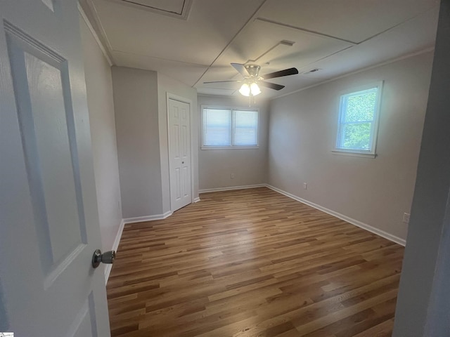 3023 Plainview Rd, Anderson, SC 29626 - unfurnished room with healthy amount of natural light, ceiling fan, wood finished floors, and crown molding