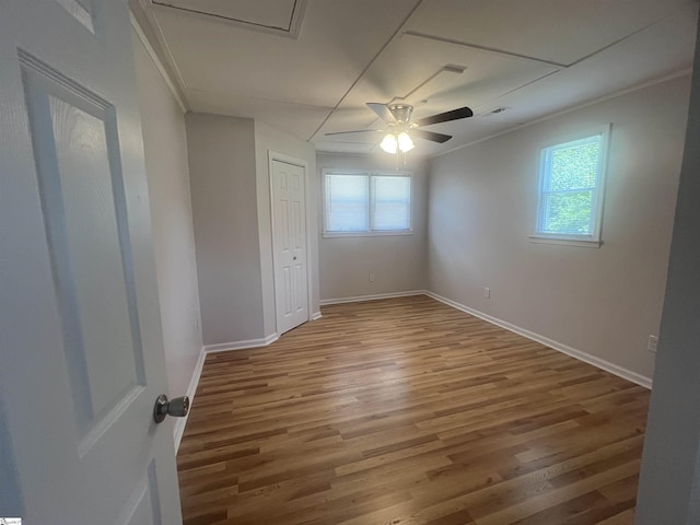 3023 Plainview Rd, Anderson, SC 29626 - empty room with healthy amount of natural light, wood finished floors, a ceiling fan, and crown molding