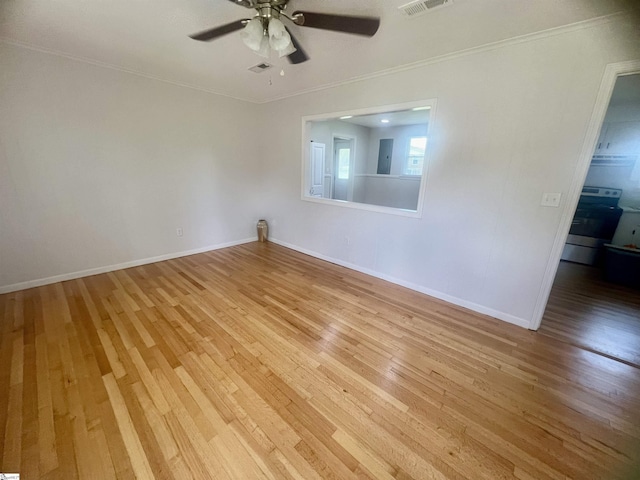 3023 Plainview Rd, Anderson, SC 29626 - unfurnished room featuring light wood-style floors, a ceiling fan, and crown molding