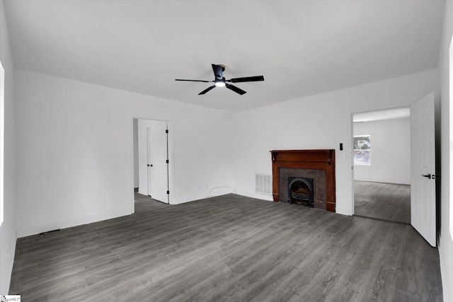 17 Smythe St, Pelzer, SC 29669 - unfurnished living room featuring wood finished floors, ceiling fan, and a fireplace