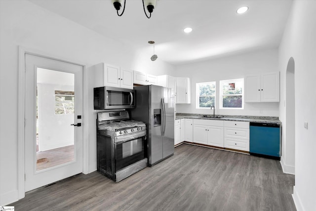 17 Smythe St, Pelzer, SC 29669 - kitchen featuring stainless steel appliances, arched walkways, wood finished floors, white cabinetry, and recessed lighting