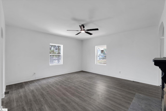 17 Smythe St, Pelzer, SC 29669 - unfurnished living room with healthy amount of natural light, ceiling fan, and dark wood-style floors
