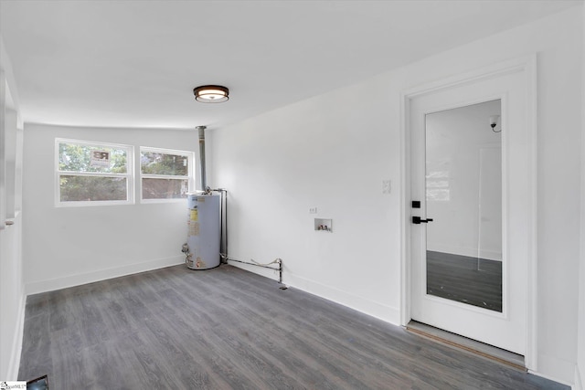 17 Smythe St, Pelzer, SC 29669 - empty room with gas water heater and wood finished floors