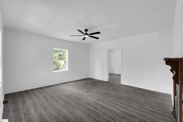17 Smythe St, Pelzer, SC 29669 - unfurnished room with dark wood finished floors and ceiling fan