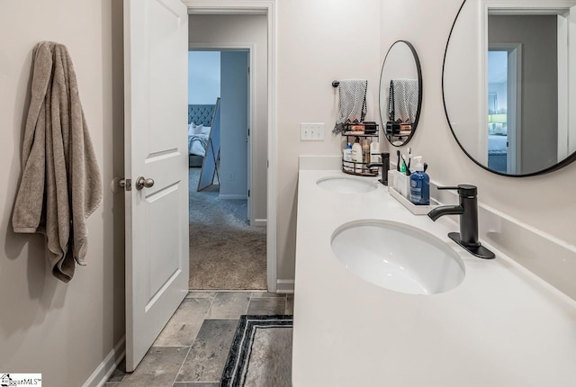 200 Bridlewood Ln, Piedmont, SC 29673 - bathroom with stone finish flooring, double vanity, and ensuite bath