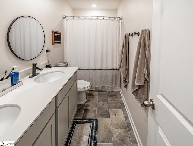 200 Bridlewood Ln, Piedmont, SC 29673 - full bathroom with stone tile flooring, double vanity, recessed lighting, and a shower with shower curtain