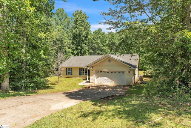 150 Mountain View Cir, Inman, SC 29349 - view of front of property with driveway, an attached garage, a front lawn, and a forest view