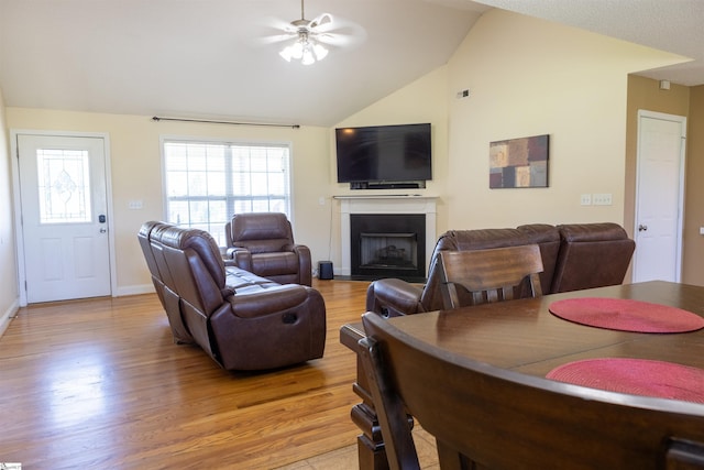 105 Hidden Springs Ct, Gaffney, SC 29341 - living area with a ceiling fan, light wood-style flooring, a fireplace, and lofted ceiling