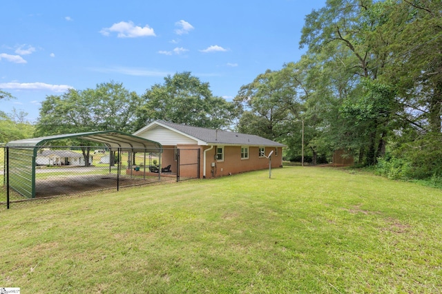 1142 Cooper Bridge Rd, Woodruff, SC 29388 - back of property featuring a detached carport and driveway