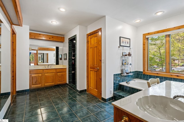207 Sassafras Dr, Taylors, SC 29687 - full bathroom with vanity, recessed lighting, a garden tub, and tile patterned flooring