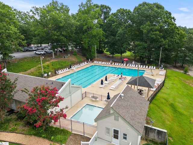 207 Sassafras Dr, Taylors, SC 29687 - community pool with a patio area and view of scattered trees