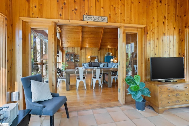 207 Sassafras Dr, Taylors, SC 29687 - tiled living area featuring wooden walls, healthy amount of natural light, and wooden ceiling