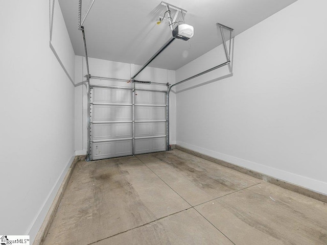 1215 Cherry Orchard Rd, Moore, SC 29369 - garage featuring a garage door opener and baseboards