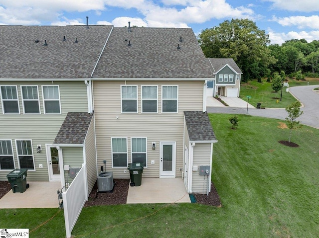 1215 Cherry Orchard Rd, Moore, SC 29369 - rear view of house featuring a patio area, a lawn, and a shingled roof