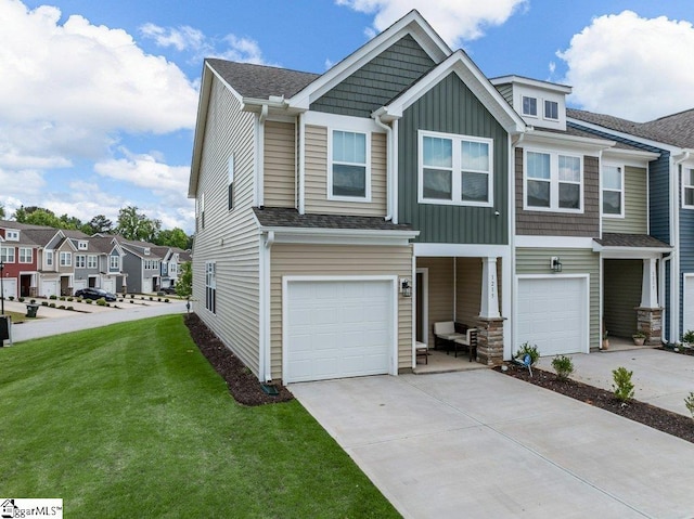 1215 Cherry Orchard Rd, Moore, SC 29369 - view of front of home with board and batten siding, a garage, concrete driveway, a front yard, and a residential view