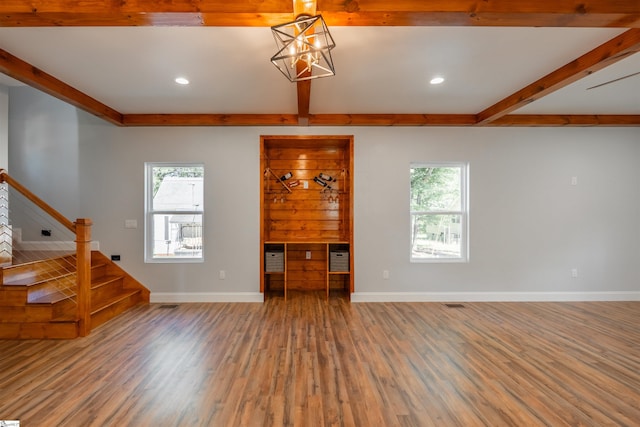 5 Mcgee St, Belton, SC 29627 - unfurnished living room featuring beamed ceiling, wood finished floors, stairs, healthy amount of natural light, and recessed lighting