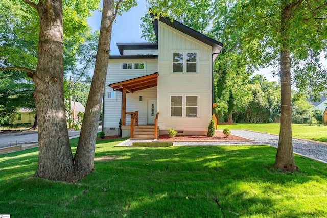 5 Mcgee St, Belton, SC 29627 - modern home with crawl space, a front lawn, and board and batten siding