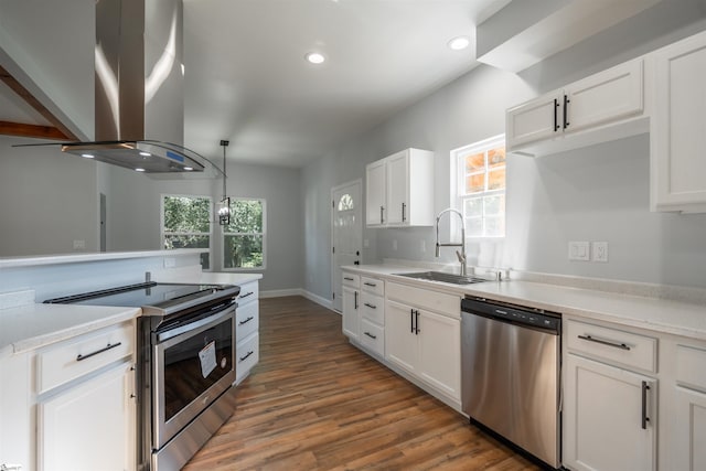 5 Mcgee St, Belton, SC 29627 - kitchen with stainless steel appliances, island exhaust hood, wood finished floors, white cabinets, and recessed lighting
