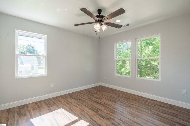 5 Mcgee St, Belton, SC 29627 - unfurnished room featuring healthy amount of natural light, wood finished floors, and a ceiling fan