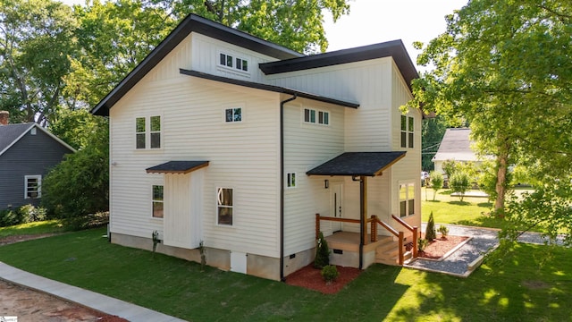 5 Mcgee St, Belton, SC 29627 - back of property with a yard, crawl space, and board and batten siding