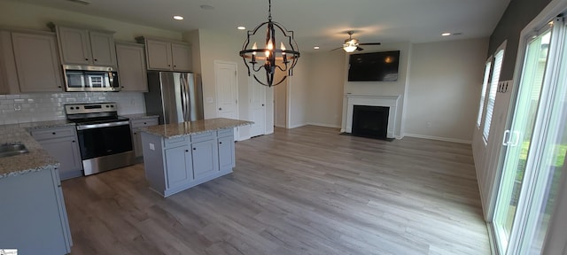 638 Grantleigh Dr, Duncan, SC 29334 - kitchen featuring stainless steel appliances, open floor plan, a center island, tasteful backsplash, and recessed lighting