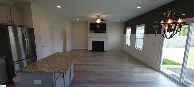 638 Grantleigh Dr, Duncan, SC 29334 - kitchen featuring freestanding refrigerator, plenty of natural light, recessed lighting, a chandelier, and light wood-style flooring