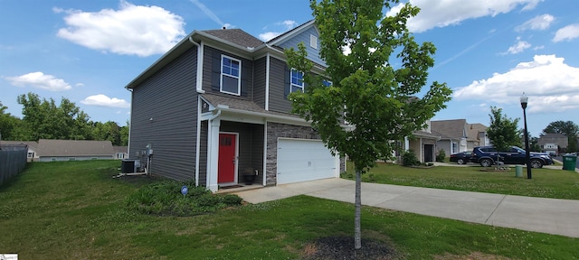 638 Grantleigh Dr, Duncan, SC 29334 - view of front facade with driveway, an attached garage, a front lawn, and stone siding