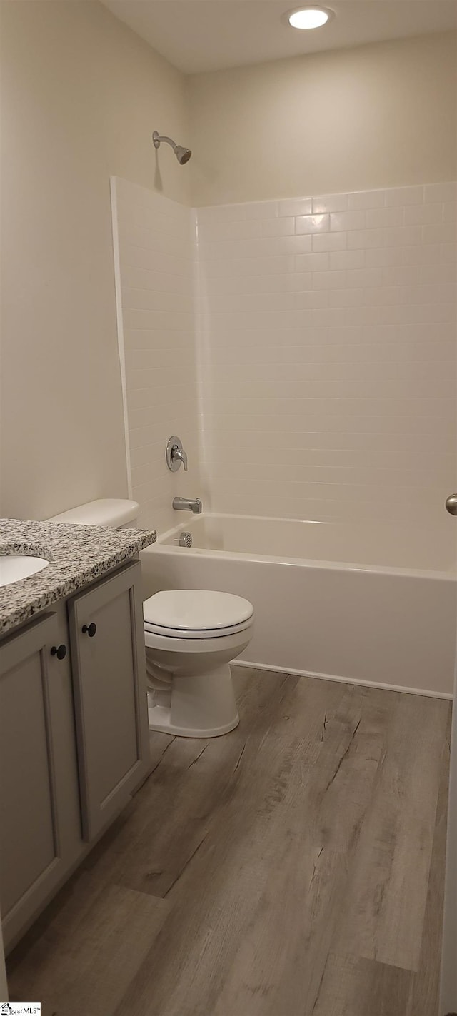 638 Grantleigh Dr, Duncan, SC 29334 - bathroom featuring bathing tub / shower combination, vanity, and wood finished floors