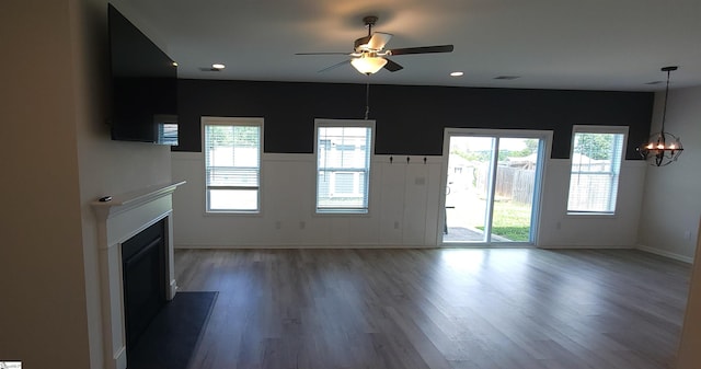 638 Grantleigh Dr, Duncan, SC 29334 - unfurnished living room with a fireplace, healthy amount of natural light, wood finished floors, ceiling fan, and recessed lighting