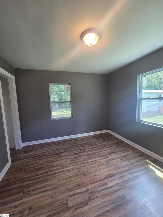 207 Sanders St, Honea Path, SC 29654 - unfurnished room with baseboards and dark wood finished floors