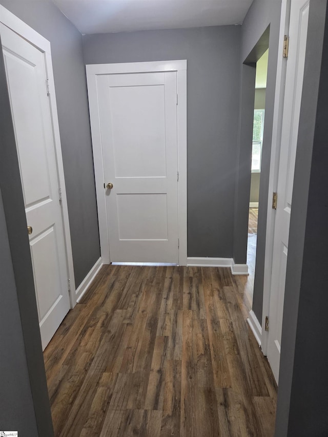 207 Sanders St, Honea Path, SC 29654 - hall featuring dark wood-style flooring and baseboards