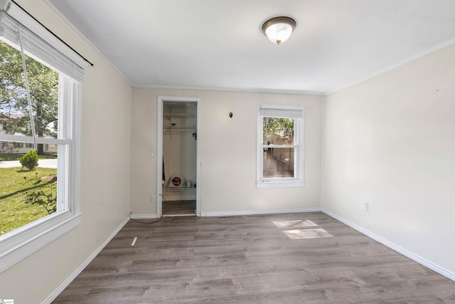 209 Edwards Rd, Lyman, SC 29365 - empty room with wood finished floors and crown molding