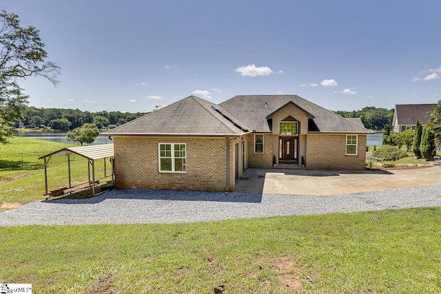 450 Johnson Ave, Anderson, SC 29621 - view of front facade featuring brick siding, a shingled roof, and a water view