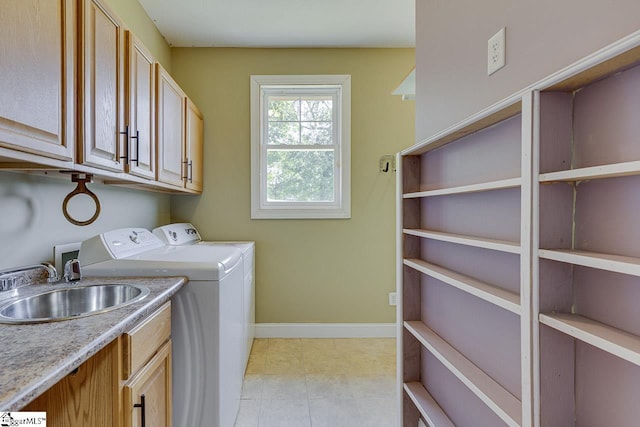 450 Johnson Ave, Anderson, SC 29621 - washroom with cabinet space, washing machine and clothes dryer, and light tile patterned flooring