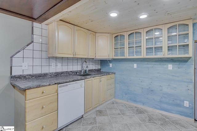 450 Johnson Ave, Anderson, SC 29621 - kitchen with dishwasher, dark countertops, glass insert cabinets, light brown cabinetry, and decorative backsplash