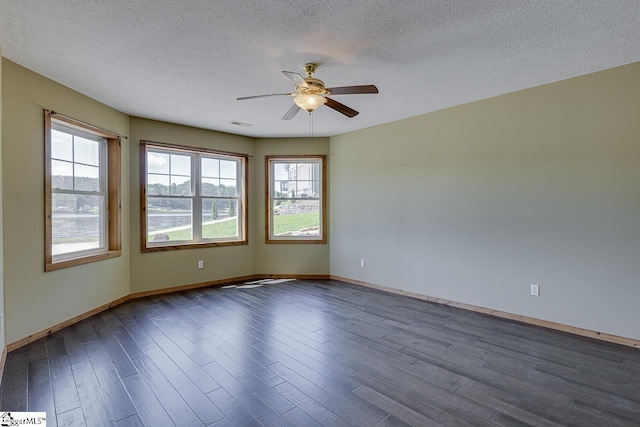 450 Johnson Ave, Anderson, SC 29621 - unfurnished room featuring a ceiling fan, dark wood-style flooring, and a textured ceiling