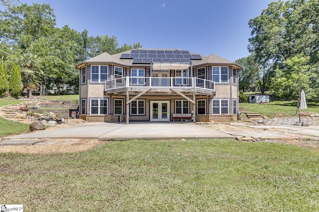 450 Johnson Ave, Anderson, SC 29621 - back of house with french doors, a lawn, solar panels, a wooden deck, and a patio area