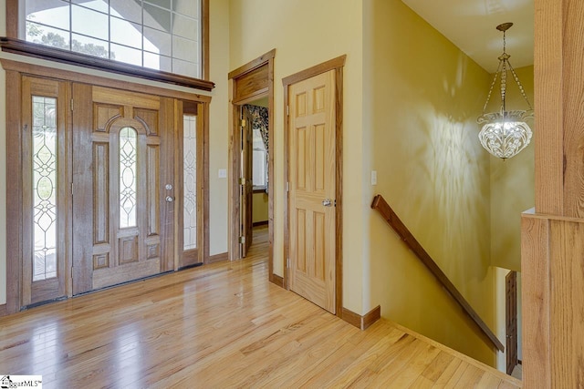 450 Johnson Ave, Anderson, SC 29621 - entryway with wood finished floors, a high ceiling, and a chandelier