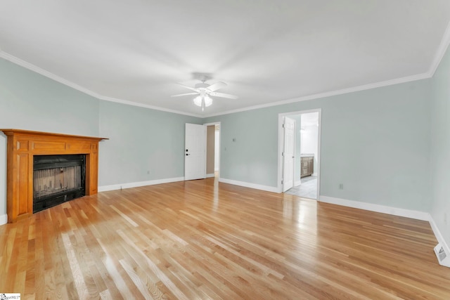 1 Moultrie Dr, Taylors, SC 29687 - unfurnished living room featuring light wood-type flooring, a fireplace, crown molding, and ceiling fan