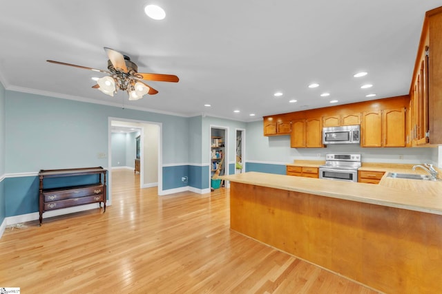 1 Moultrie Dr, Taylors, SC 29687 - kitchen featuring stainless steel appliances, light countertops, recessed lighting, ceiling fan, and a peninsula