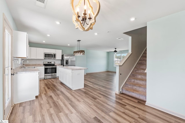 166 Bleckley Trl, Anderson, SC 29625 - kitchen featuring stainless steel appliances, a chandelier, light countertops, a center island, and recessed lighting