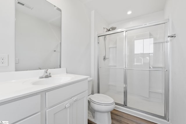 166 Bleckley Trl, Anderson, SC 29625 - bathroom with vanity, a shower stall, wood finished floors, and recessed lighting