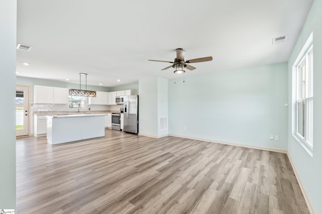 166 Bleckley Trl, Anderson, SC 29625 - unfurnished living room with light wood finished floors, recessed lighting, and a ceiling fan
