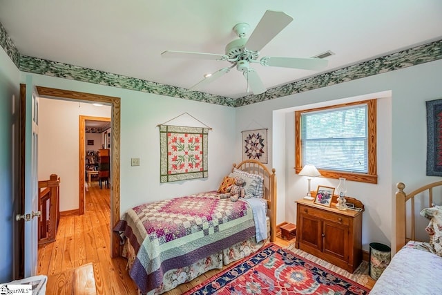 512 Doe Run, Pickens, SC 29671 - bedroom with light wood finished floors and ceiling fan