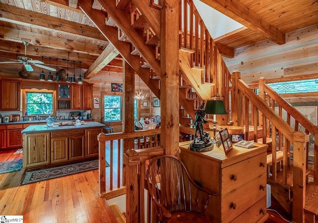 512 Doe Run, Pickens, SC 29671 - stairway featuring wooden walls, wood-type flooring, ceiling fan, and a wood ceiling with exposed beams