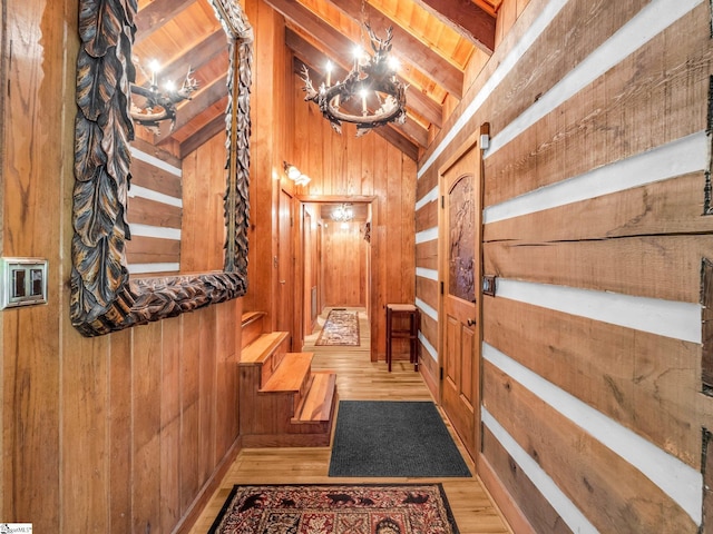 980 Mountain Forest Dr, Union Mills, NC 28167 - hallway featuring wood walls, wood finished floors, and stairway