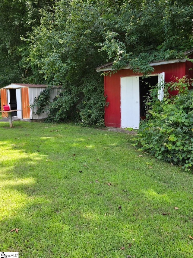 132 Mustang Cir, Simpsonville, SC 29681 - view of green lawn with a shed