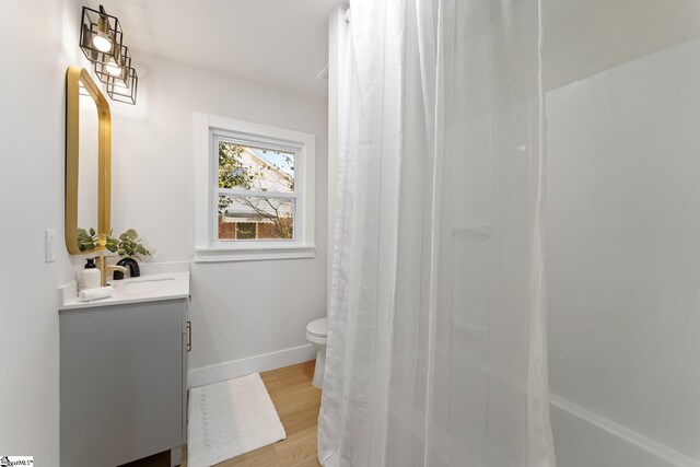 3209 Howland Dr, Anderson, SC 29626 - full bathroom with vanity, wood finished floors, and shower / tub combo